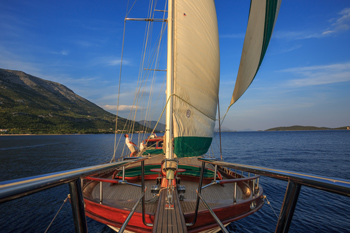 The 30m Sail Dalmatia's Carpe Diem 7 gulet is sailing past Solta Island, Dalmatia. Croatia