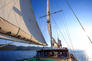 The Carpe Diem 7 gulet crew are hoisting the sails in Milna Bay, Dalmatia, Croatia